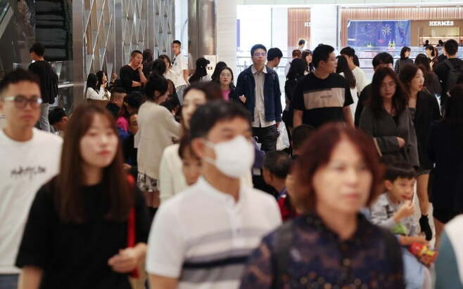 Customers at duty-free shops in the Lotte World Mall, Seoul, on Oct. 2