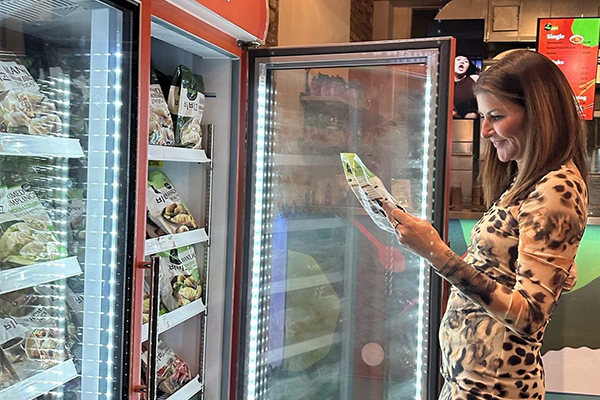 A customer browses for dumplings at Bibigo’s Shoreditch pop-up store (Courtesy of CJ CheilJedang)