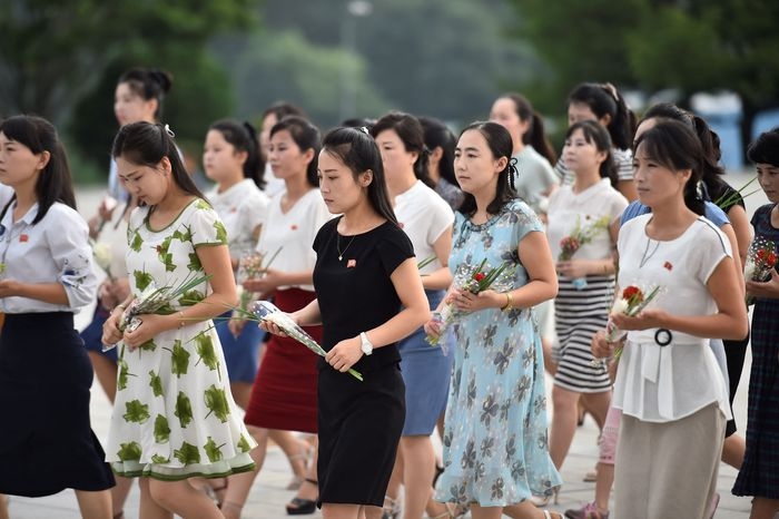North　Korean　women　face　widespread　discrimination　in　the　country’s　deeply　patriarchal　society. PHOTO: KIM　WON　JIN/AGENCE　FRANCE-PRESSE/GETTY　IMAGES