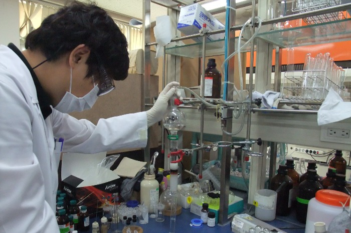 A researcher at a LegoChem Bio lab