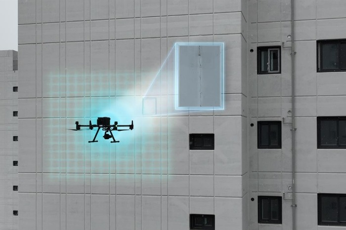 Drone-based POS-Vision for detecting apartment exterior wall defects