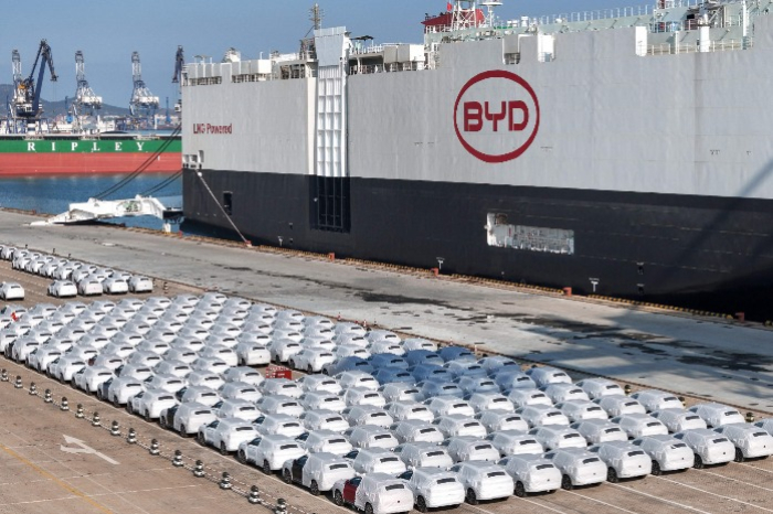 BYD electric cars for export await vessel loading on Jan. 10, 2024 (Courtesy of AFP via Yonhap)