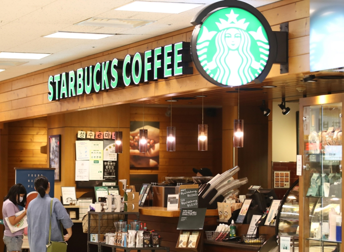 Starbucks reigns in coffee republic of South Korea; Drink, play and work