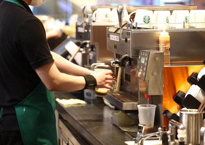 Starbucks reigns in coffee republic of South Korea; Drink, play and work