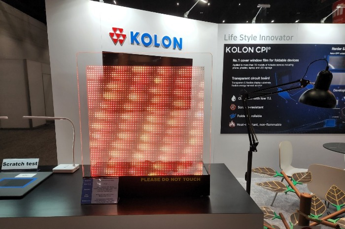 Kolon　Industries'　booth　displaying　CPI　film　at　2022　SID　in　San　Jose,　California　(Courtesy　of　Kolon　Industries)