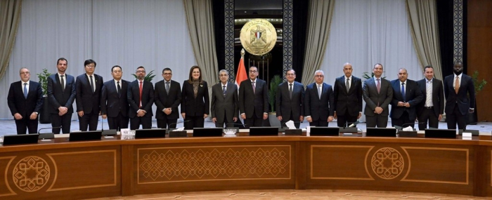 Officials　of　CSCEC,　SK　Ecoplant　and　the　Egyptian　government　authorities　take　a　picture　after　signing　a　deal　on　a　renewable　energy　project　on　Feb.　28,　2024,　at　the　country’s　prime　minister’s　office　in　Cairo　(Courtesy　of　Yonhap)
