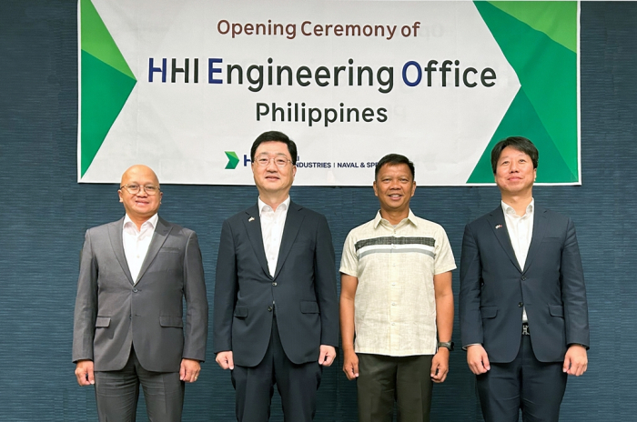 HD Hyundai Heavy executives and senior officials from the Philippines' Defense Ministry and the Navy pose for a photo during the launch ceremony of HHI Engineering Office in Manila