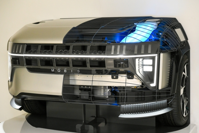 Integrated front face module for electric car by Hyundai Mobis