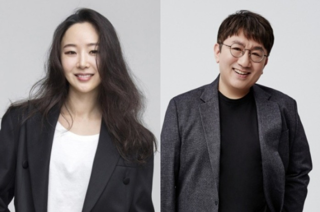 ADOR CEO Min Hee-jin (on left) and HYBE Chairman Bang Si-hyuk