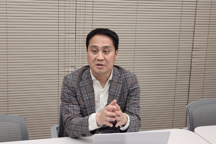 Kim　Jeong-nam,　chief　executive　of　Gugus