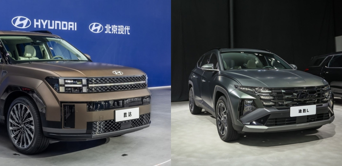 The　all-new　Santa　Fe　(left)　and　the　new　Tucson　at　the　Beijing　Auto　Show　(Courtesy　of　Hyundai)