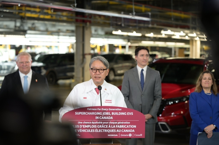 Ontario　Premier　Doug　Ford　(from　left),　Canadian　Prime　Minister　Justin　Trudeau　and　Canadian　Finance　Minister　Chrystia　Freeland　look　on　as　Honda　CEO　Toshihiro　Mibe　speaks　at　an　event　announcing　an　　billion　investment　plan　in　Alliston,　Ontario　on　April　25,　2024.　Honda　is　set　to　build　a　battery　materials　plant　with　POSCO　Future　M　there　(Courtesy　of　Honda)