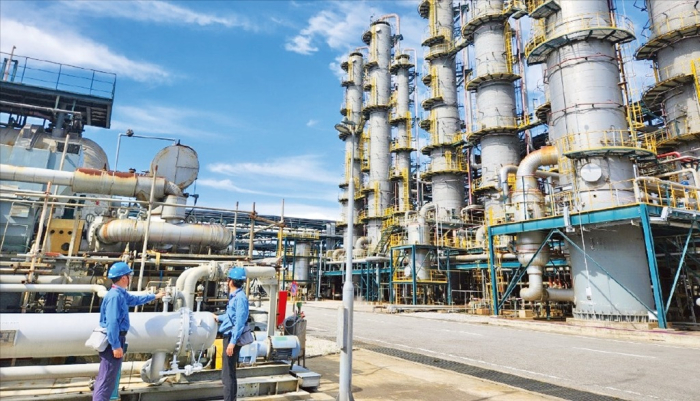 OCIM staff check facilities at its polysilicon factory on April 25, 2024, in Sarawak, Malaysia (Photo: Woo-Sub Kim)