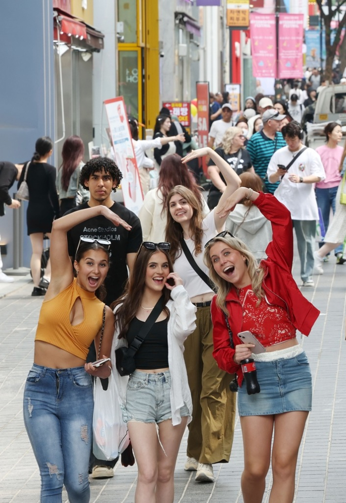 Foreigners　in　Myeong-dong,　international　tourists’　top　destination　in　Seoul,　on　April　30,　2024　(By　Bum-June　Kim)