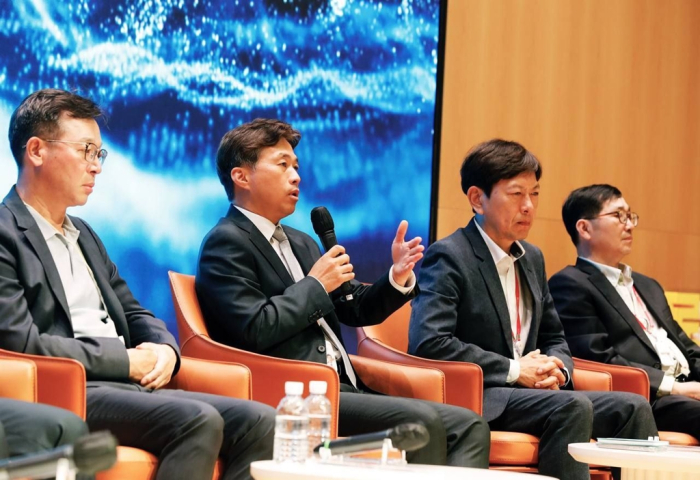 SK Hynix CEO Kwak Noh-jung (second from left) and company executives take questions during a press conference at SK Hynix's headquarters on May 2, 2024
