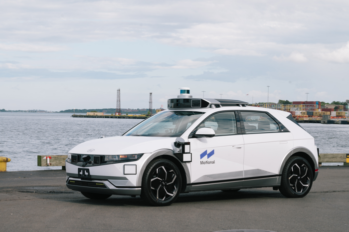 Motional's　IONIQ　5　robotaxi　parked　at　Boston　Harbor　(Courtesy　of　Motional)