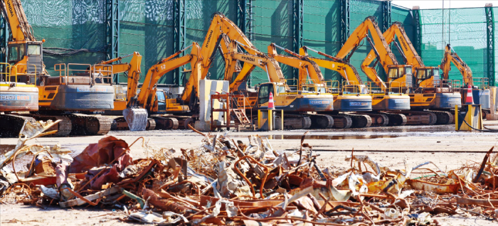 Scrap steel piled at Dongkuk Still Mill's plant in Incheon