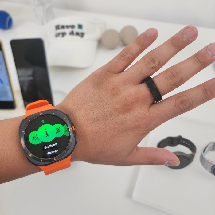 A visitor to Samsung's Galaxy Unpacked 2024 event in Paris tests the Galaxy Ring and the Galaxy Watch7