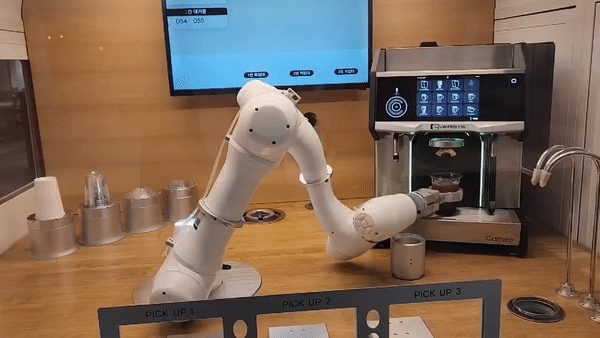 A Doosan collaborative robot serves coffee