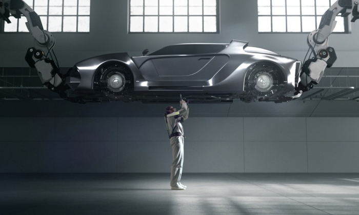 An　engineer　in　a　vest-type　wearable　robot　works　at　a　car　manufacturing　plant　(File　photo　by　Hyundai　Motor　Group)