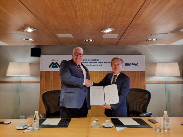 Ricardo Vicintin, chairman of RIMA Group (left), and Choi Jin-Shik, chairman of SIMPAC Group