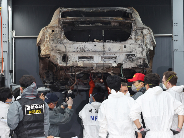 Police investigate the cause of a fire involving a Mercedes-Benz EV in Incheon, Korea