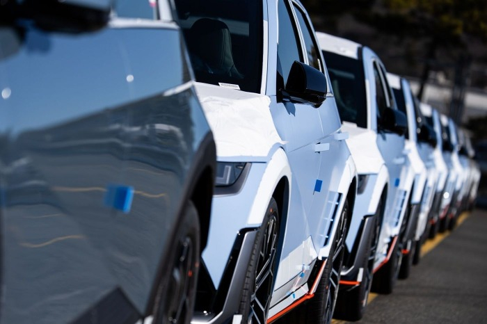 Electric vehicles await shipment at a port near Ulsan, South Korea. Photo: SeongJoon Cho/Bloomberg News