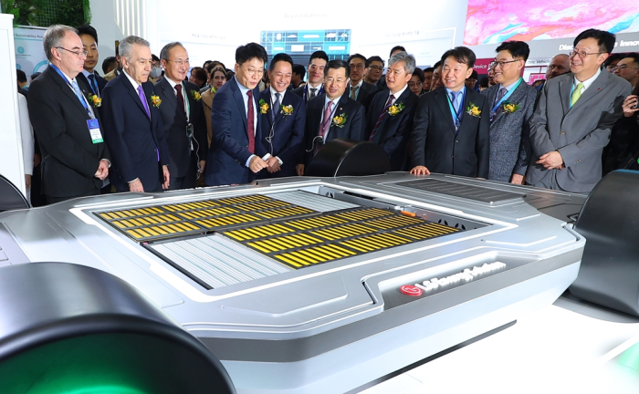 Battery executives visit LG Energy Solution's booth at Interbattery 2024 and look over its cell-to-pack battery concept