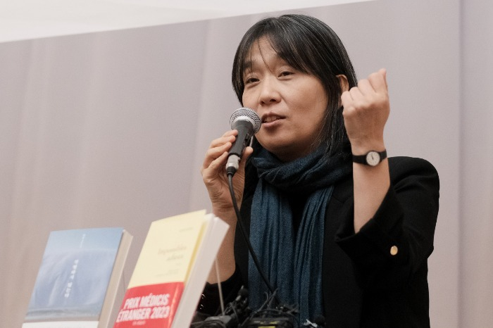 Han Kang speaks at a press conference in November 2023 (Courtesy of Yonhap)