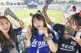 Twenty-something female away team fans lead Korean baseball craze