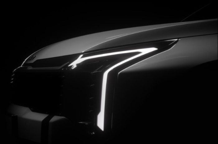 The teaser image of Kia's The New Sportage