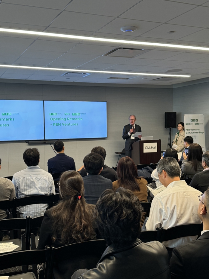 Korean Society CEO Thomas Byrne (at the podium) speaks at the PEN CTA event in New York
