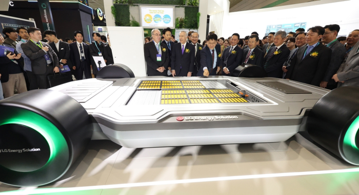 Battery executives visit LG Energy Solution's booth at Interbattery 2024 and examine its cell-to-pack battery concept