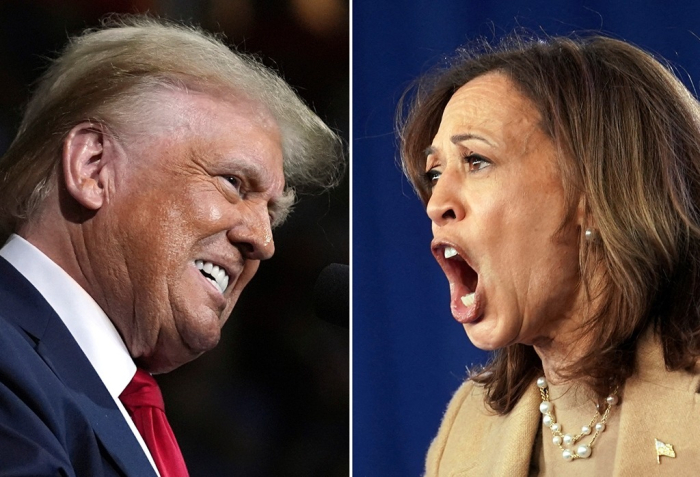 Democratic presidential nominee, US Vice President Kamala Harris (right), speaks during a campaign rally in Charlotte, North Carolina, on Nov. 2, 2024 (File photo by Reuters via Yonhap)