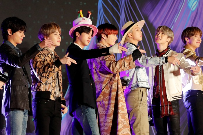 The　seven-member　boy　band　BTS　was　formed　in　2010