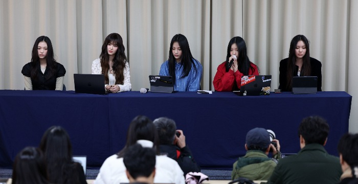 NewJeans members hold a press conference on Nov. 28, 2024 to announce their departure from ADOR (Courtesy of News1 Korea)
