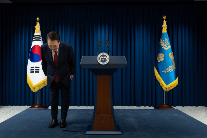 South Korean President Yoon Suk Yeol apologizes for his botched attempt to impose martial law in a nationally televised speech on Dec. 7, 2024