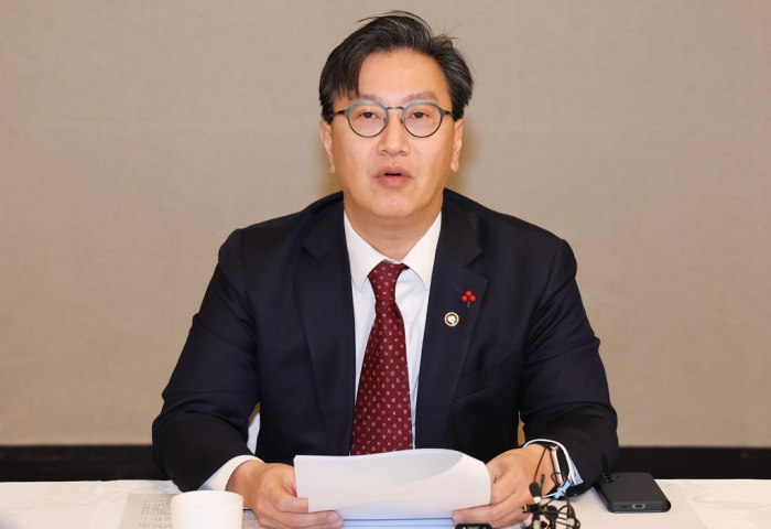 Kim Beom-seok, first vice minister of economy and finance, presides over an emergency economic meeting to announce measures to ease Korea's forex regulations