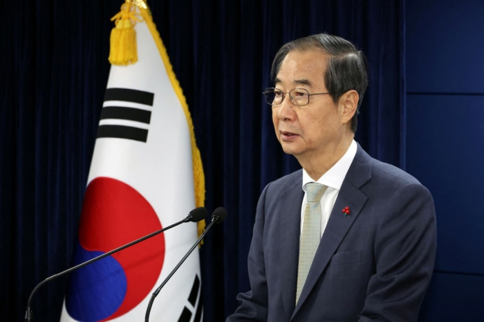 Acting South Korean President and Prime Minister Han Duck-soo delivers an address to the nation at the government complex in Seoul on Dec. 14, 2024 (Courtesy of Yonhap via Reuters)