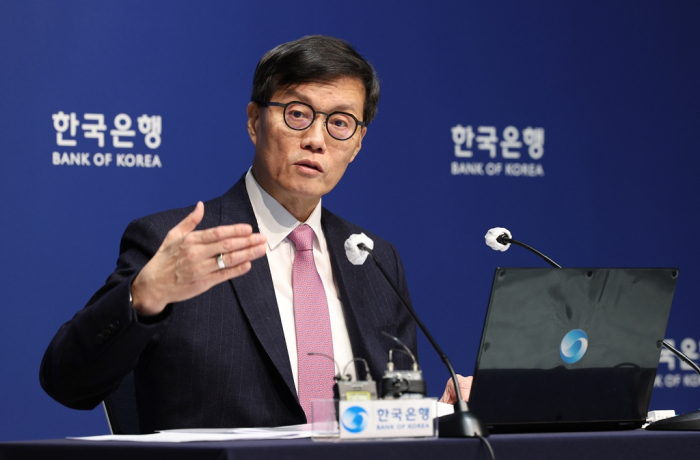 Bank of Korea Governor Rhee Chang-yong speaks to reporters after the central bank unexpectedly leaves interest rates unchanged on Jan. 16, 2025 (Press pool photo)