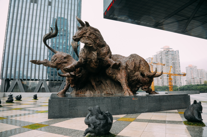 A statue in front of the Shenzhen Stock Exchange in Shenzhen, China (Courtesy of Getty Images)
