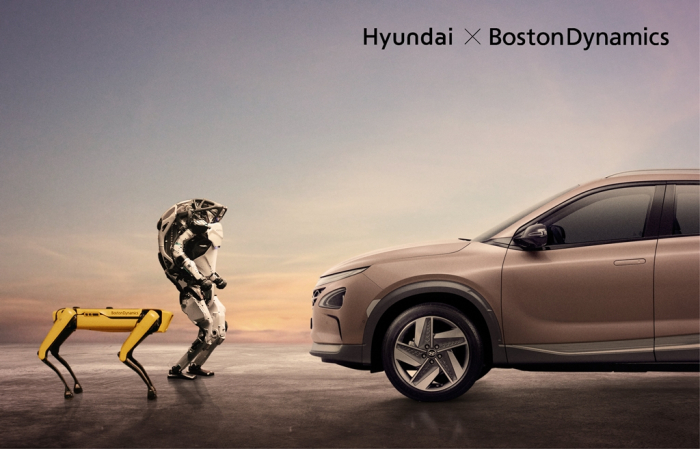Boston Dynamics' dog-like robot Spot (from left), humanoid robot Atlas and Hyundai Motor's NEXO hydrogen vehicle