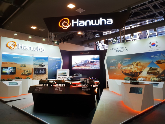 A　mockup　of　Hanwha　Aerospace's　armored　vehicle　Redback　on　display　at　an　exhibition