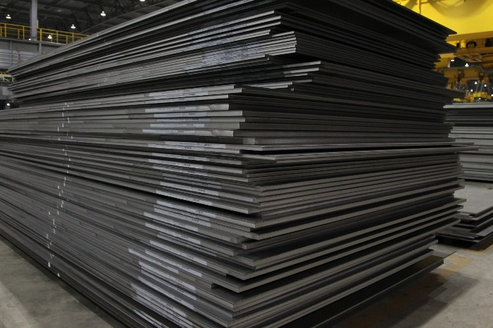 A　stack　of　steel　plates　at　Hyundai　Steel's　plant　in　Dangjin,　South　Chungcheong　Province
