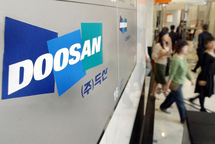 Doosan　Corp.　is　the　holding　firm　of　Doosan　Group