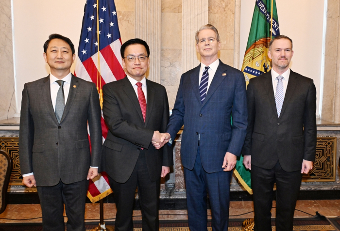 From left, South Korea's Trade Minister Ahn Duk-geun, Finance Minister Choi Sang-mok, US Treasury Secretary Scott Bessent and US Trade Representative Jamieson Greer pose for a photo prior to their trade talks in Washington on April 24, 2025