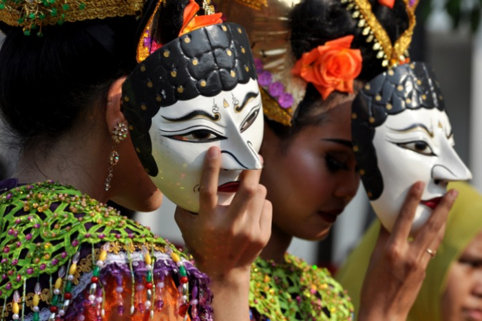 Betawi mask dancers prepare to perform at a cultural festival in Jakarta, Indonesia (Courtesy of Getty Images)