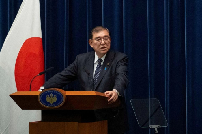 Japan's Prime Minister Shigeru Ishiba speaks during a press conference at the prime minister's office in Tokyo on Dec 24, 2024 (Courtesy of Reuters via Yonhap)