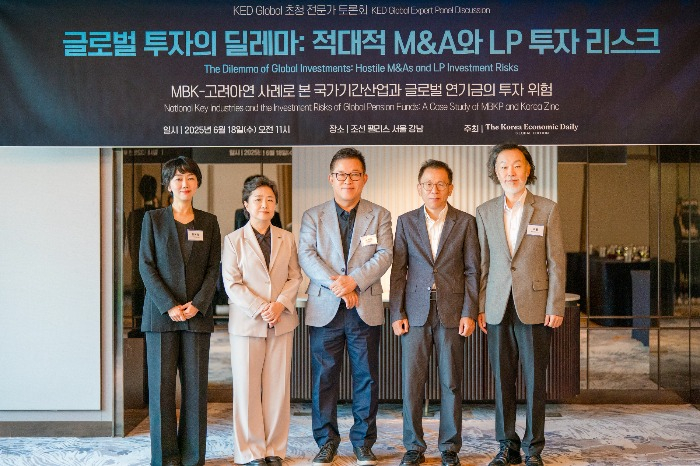Panelists of the KED Global expert panel discussion pose for a photo