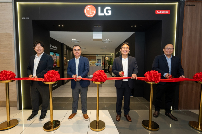 LG Electronics' officials cut the ribbon at the opening of a home appliance subscription service store in Singapore (Courtesy of LG Electronics)